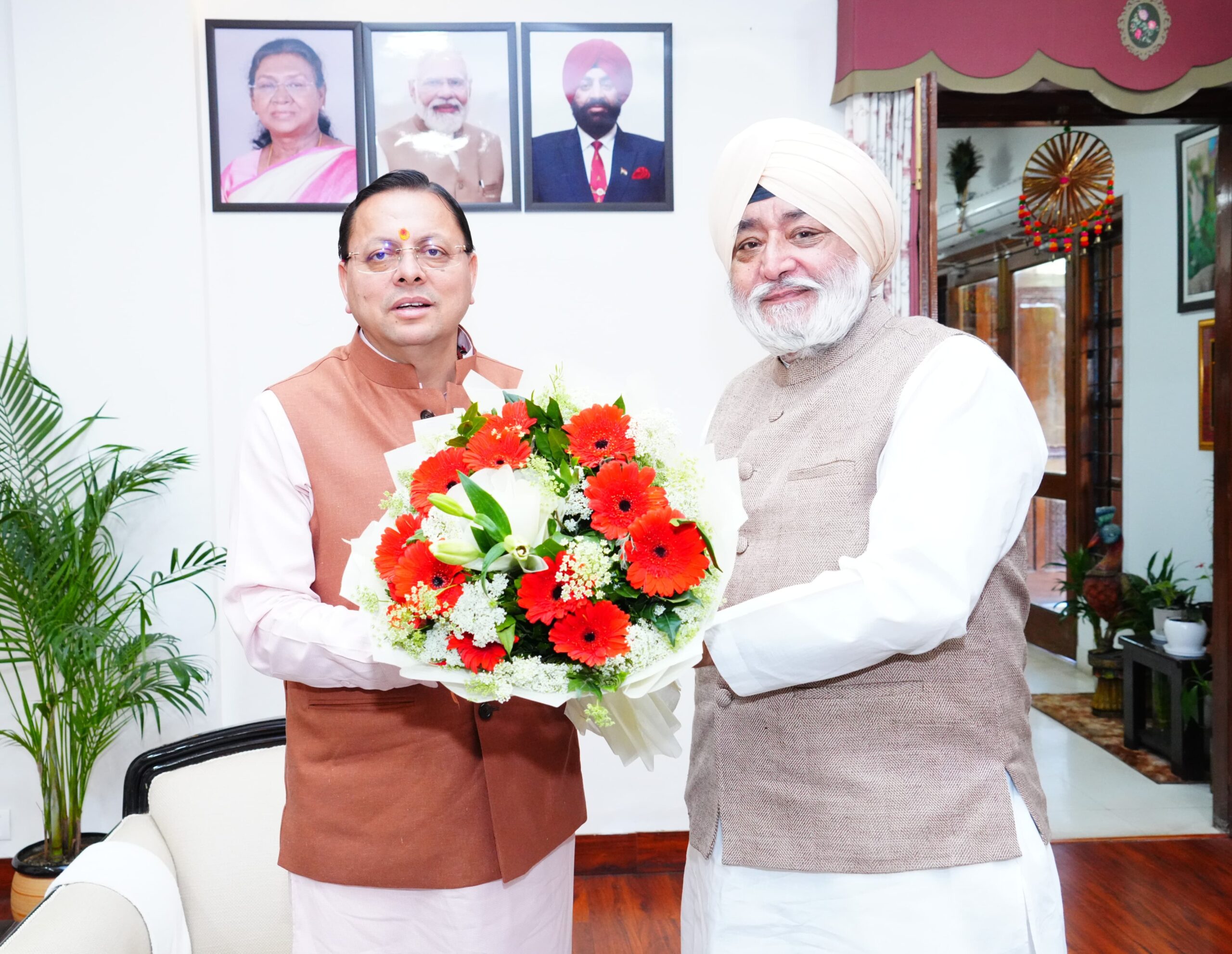 सीएम धामी से नरेंद्र जीत सिंह बिंद्रा ने भेंट की